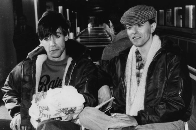 March 1977:  Rock singers David Bowie, right, and Iggy Pop in Germany.  (Photo by Evening Standard/Getty Images)