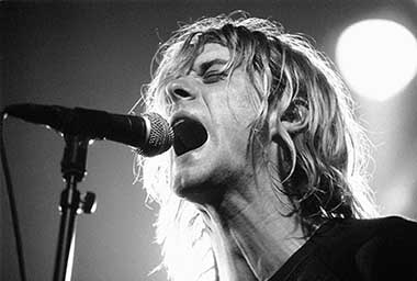 AMSTERDAM, NETHERLANDS - NOVEMBER 25: Kurt Cobain from Nirvana performs live on stage at Paradiso in Amsterdam, Netherlands on November 25 1991 (photo by Frans Schellekens/Redferns)